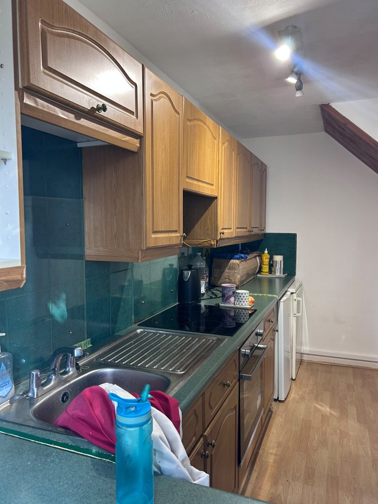 The old oak kitchen with green worktops before the refit